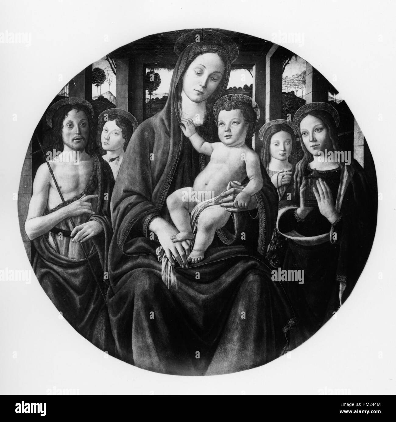 La "Madonna con bambino e quattro santi" è un dipinto rinascimentale che raffigura la Madonna e il bambino Cristo circondato da quattro santi. L'opera mostra i temi religiosi e i dettagli intricati caratteristici del periodo. Foto Stock