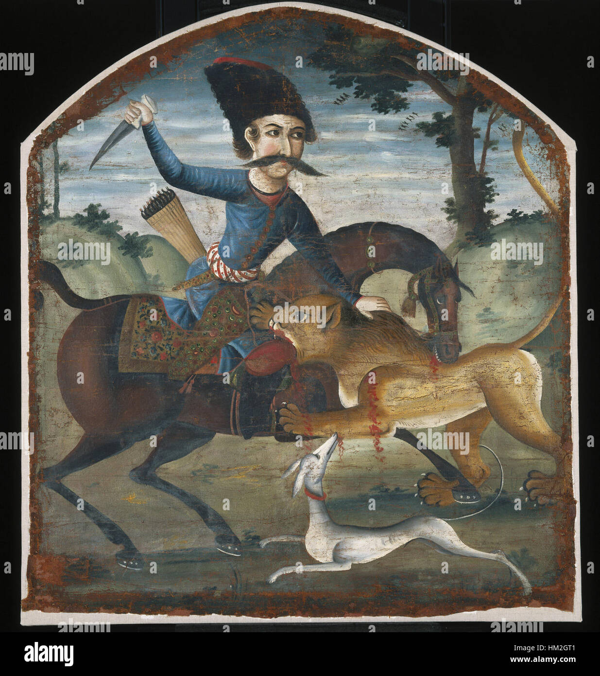 Questo drammatico dipinto raffigura un cacciatore a cavallo attaccato da un leone, illustrando la potenza grezza della natura e il pericoloso rapporto tra uomo e bestia. Foto Stock