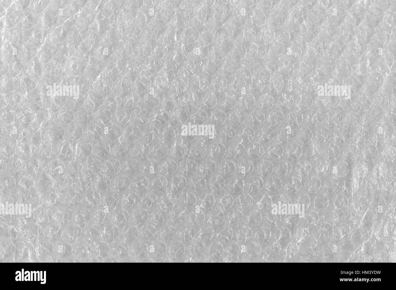 Bubble Wrap Texture di sfondo astratto, a trama dettagliata Horizontal Macro Closeup, luminoso modello di bianco in plastica trasparente bolle di aria bubblewrap Foto Stock