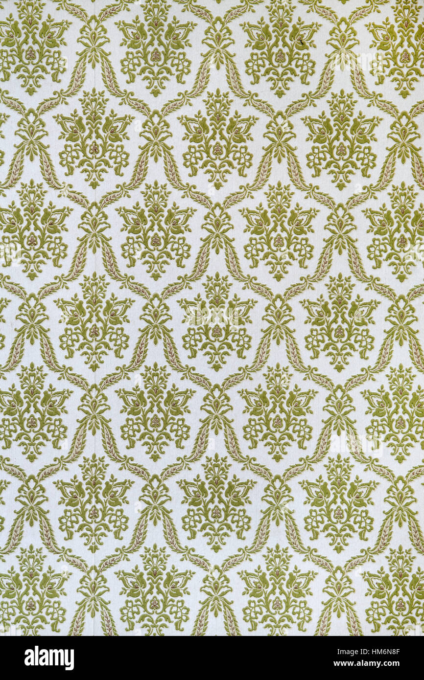 Vecchia carta da parati con il barocco e pattern di antiquariato in verde bianco come sfondo Foto Stock