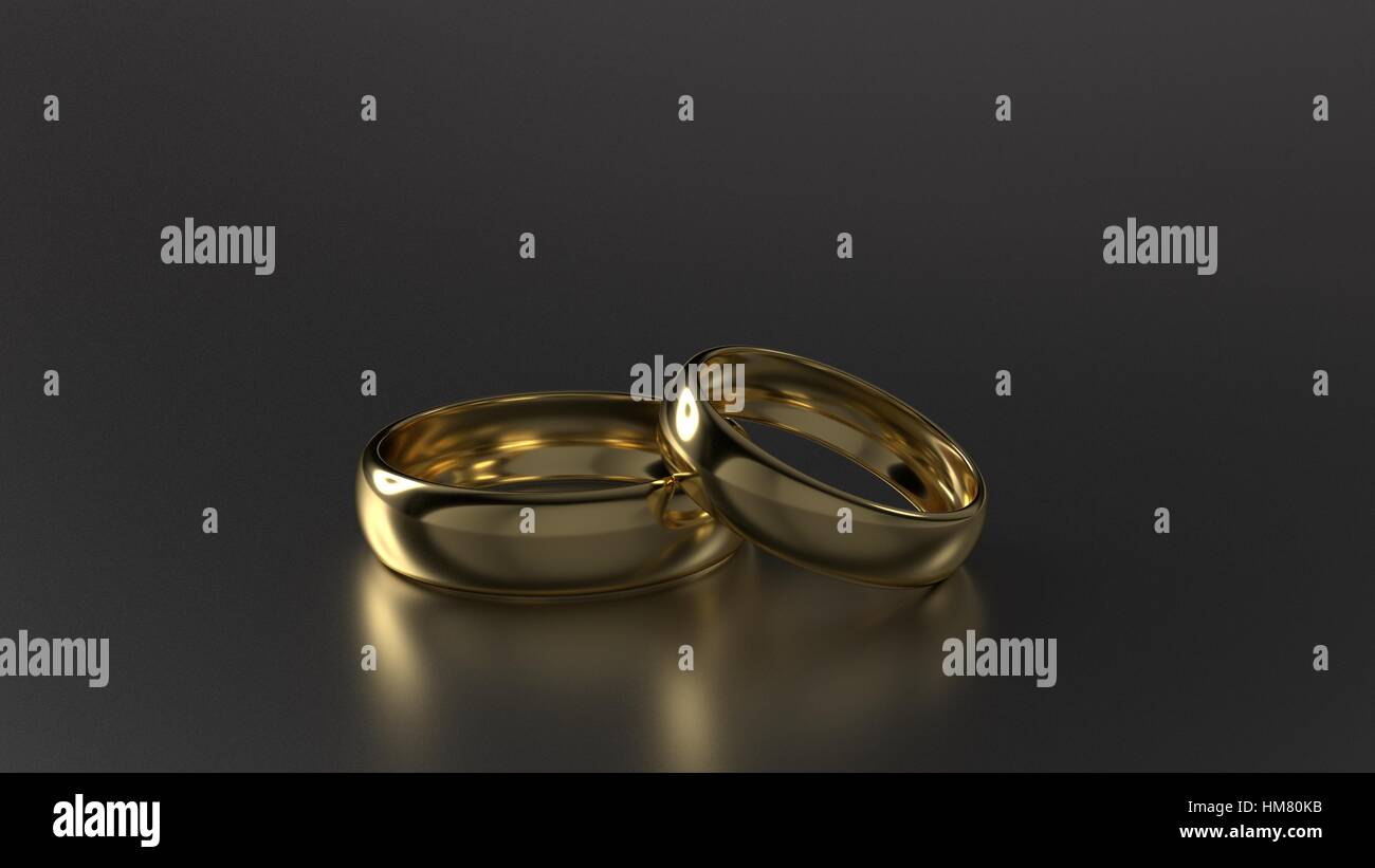 Paio di bellezza oro anelli di nozze su sfondo nero. 3D illustrazione Foto Stock