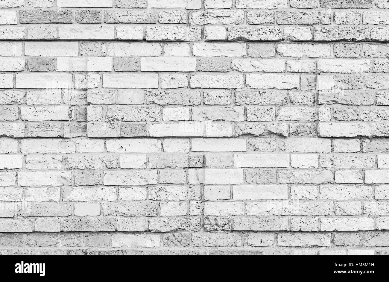 Bianco vecchio muro di mattoni con una decorazione rectanglular modello a rilievo, foto di sfondo texture Foto Stock