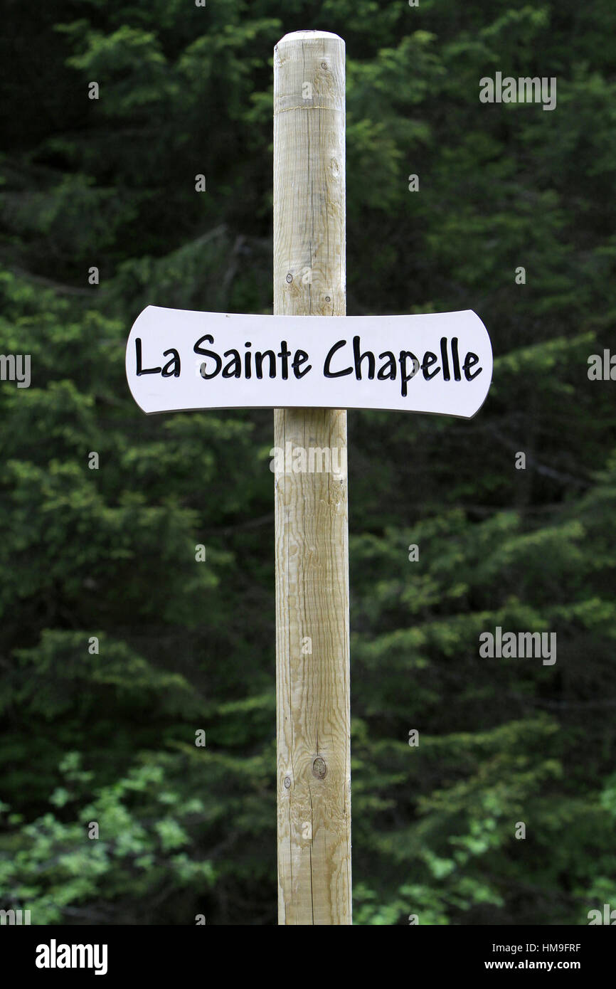La placca sur onu poteau : "La Sainte Chapelle'. Les Contamines-Montjoie. La Francia. Foto Stock