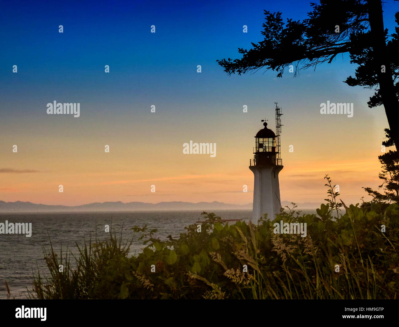 Canada nazionale storico edificio in Vancouver Island - meraviglioso twilight Sheringham Point Lighthouse closeup, Shirley, BC Canada 1. Foto Stock