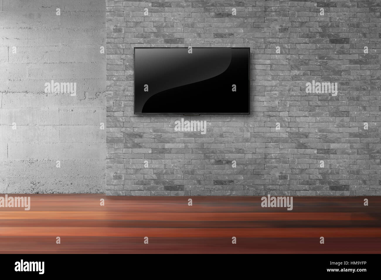 Soggiorno tv led su un muro di mattoni in interrior vuota Foto Stock