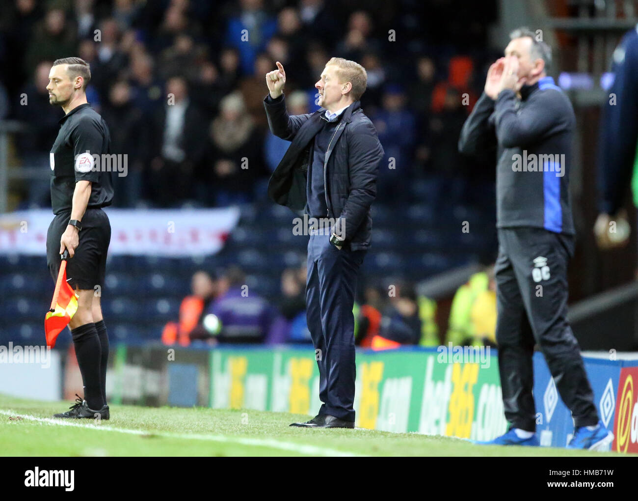 Blackburn Rovers manager Owen Coyle (destra) e Leeds United manager Garry Monaco (sinistra) durante il cielo di scommessa match del campionato a Ewood Park di Blackburn. Foto Stock