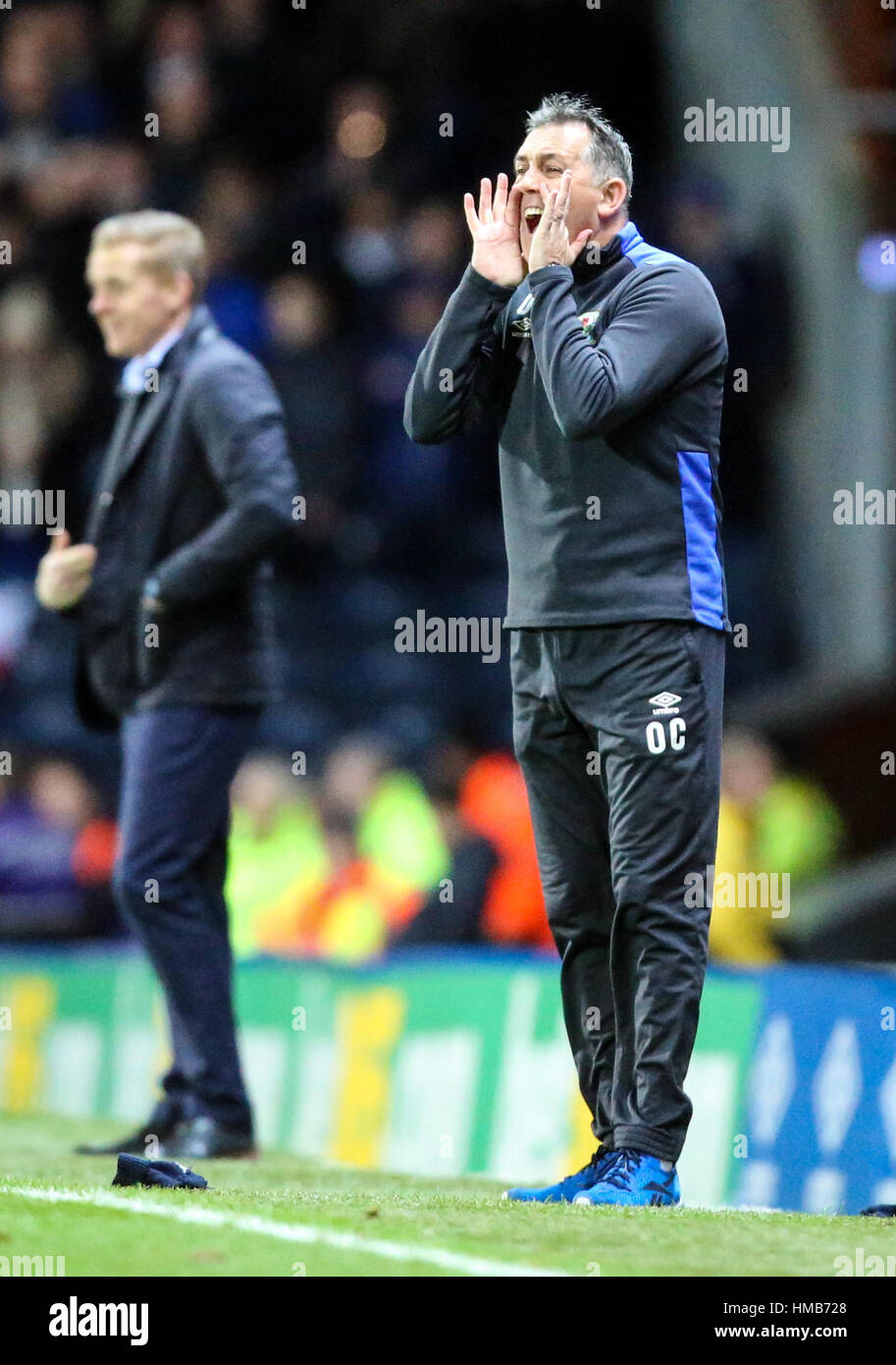 Blackburn Rovers manager Owen Coyle (destra) e Leeds United manager Garry Monaco (sinistra) durante il cielo di scommessa match del campionato a Ewood Park di Blackburn. Foto Stock