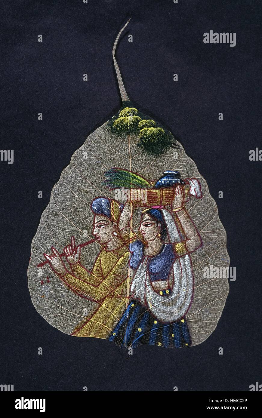 Lettore di flauto e la donna che porta un cestello, decorato a foglia, artigianato indiano. Foto Stock