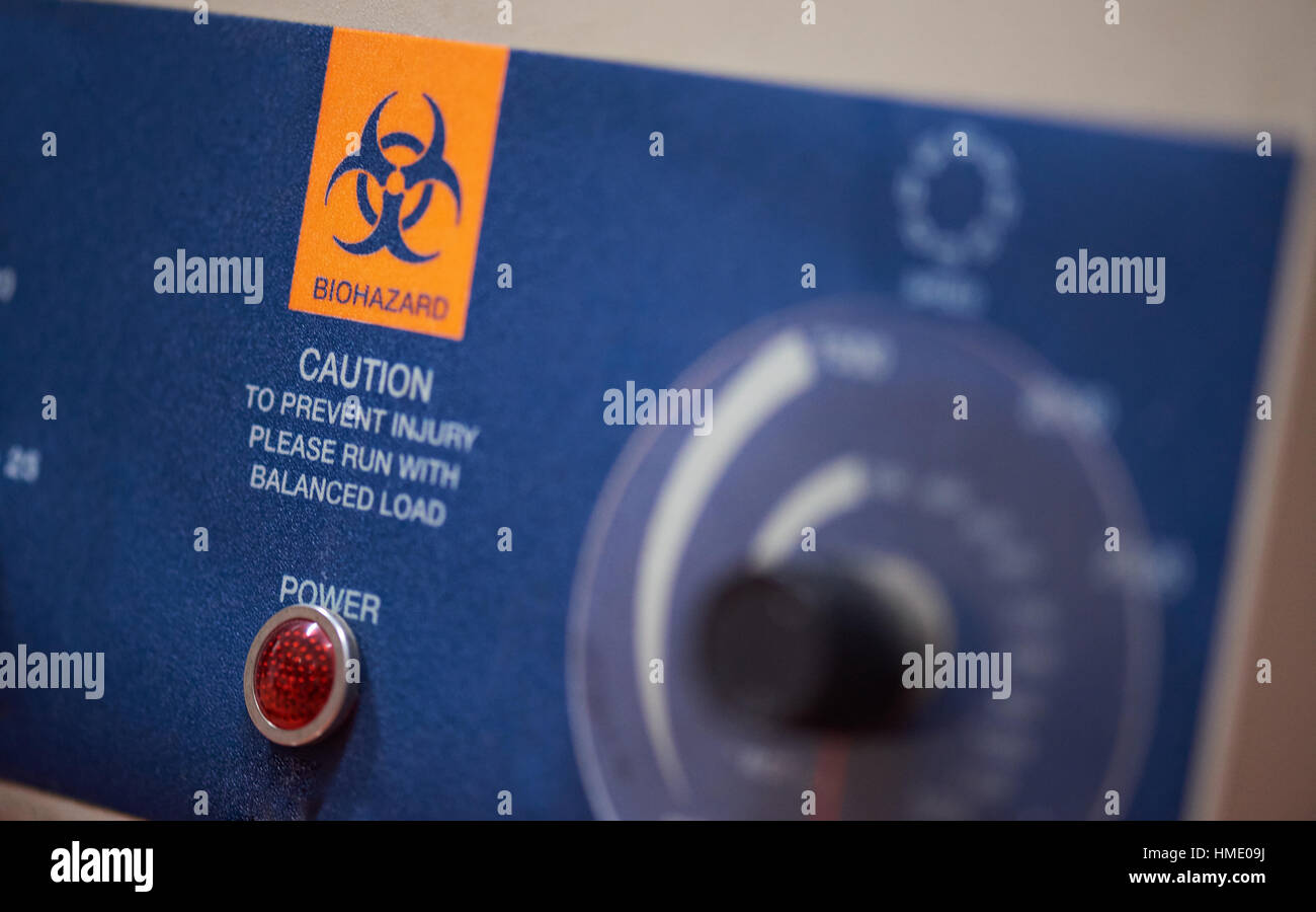 Biohazard segno di attenzione sul dispositivo chemichal Foto Stock