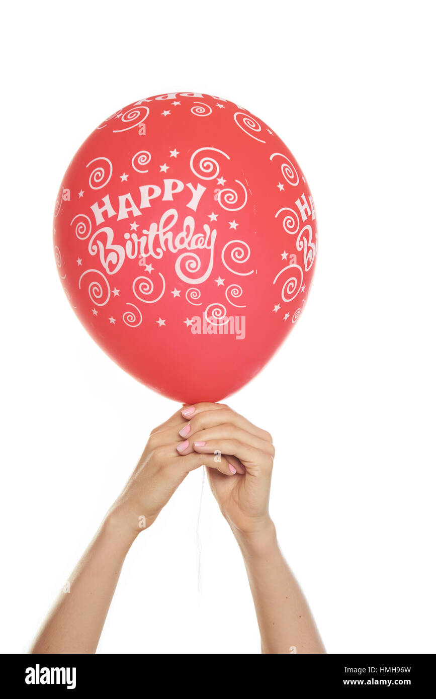 Donna mani red happy birthday palloncino Foto Stock