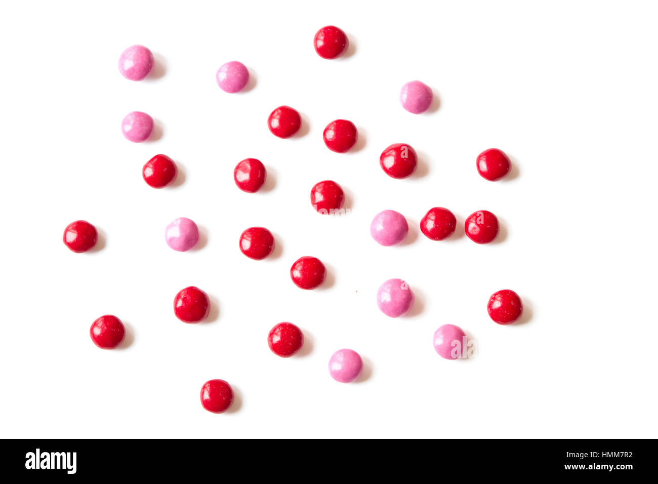 Rosso e Rosa candy isolati su sfondo bianco Foto Stock