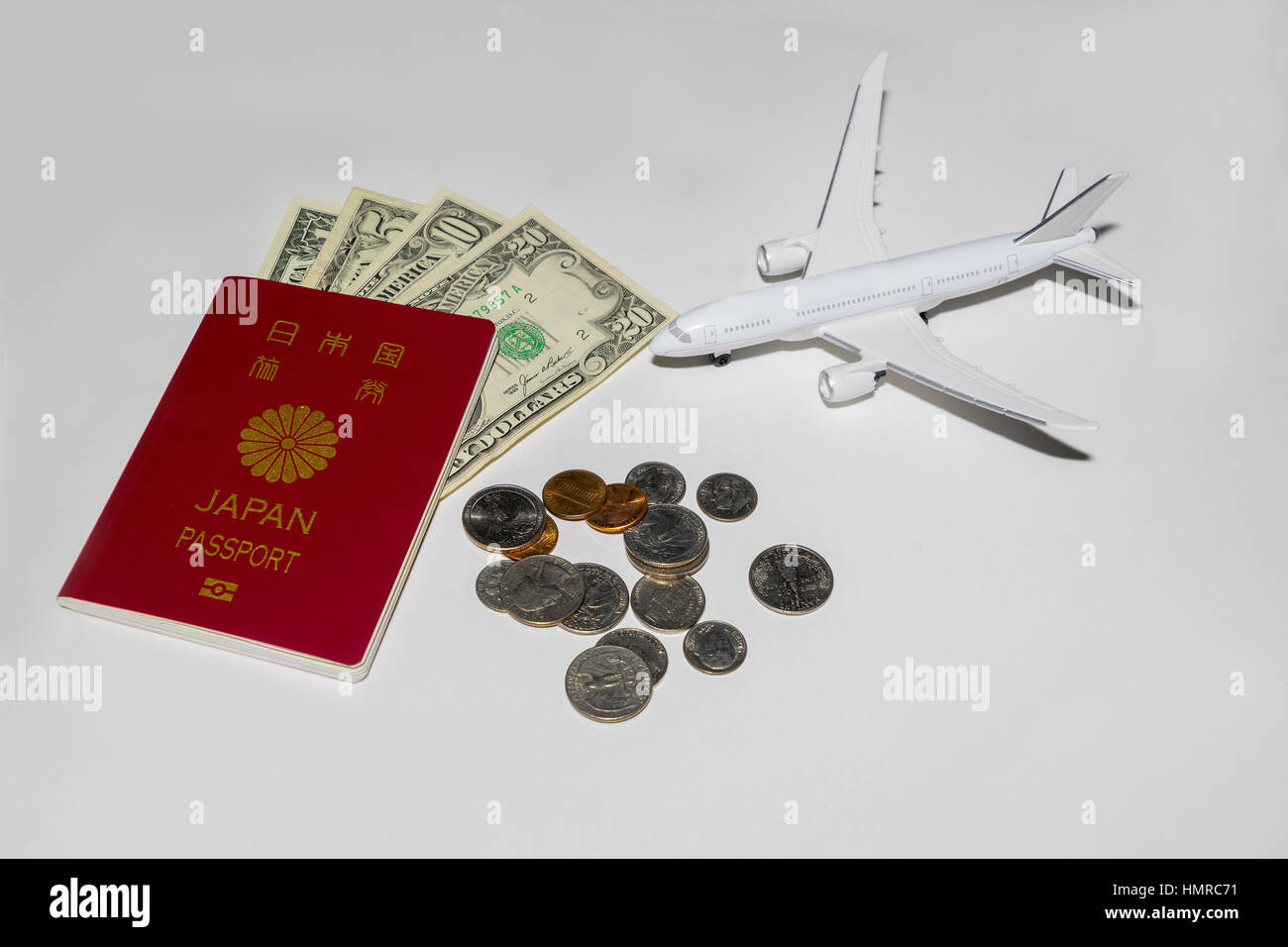 Passaporto giapponese, US Dollar e aereo Foto Stock