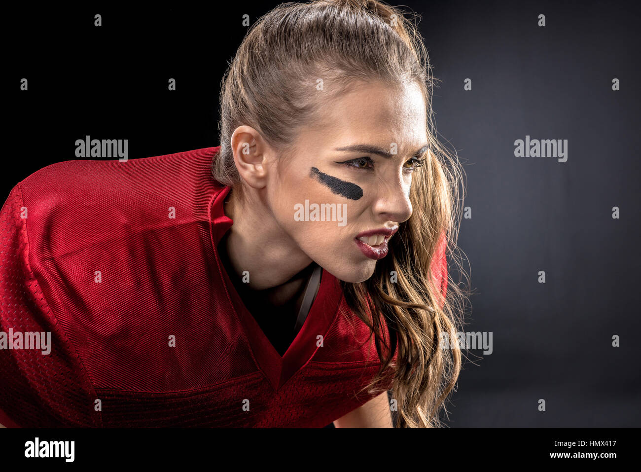 Femmina di giocatore di football americano Foto Stock
