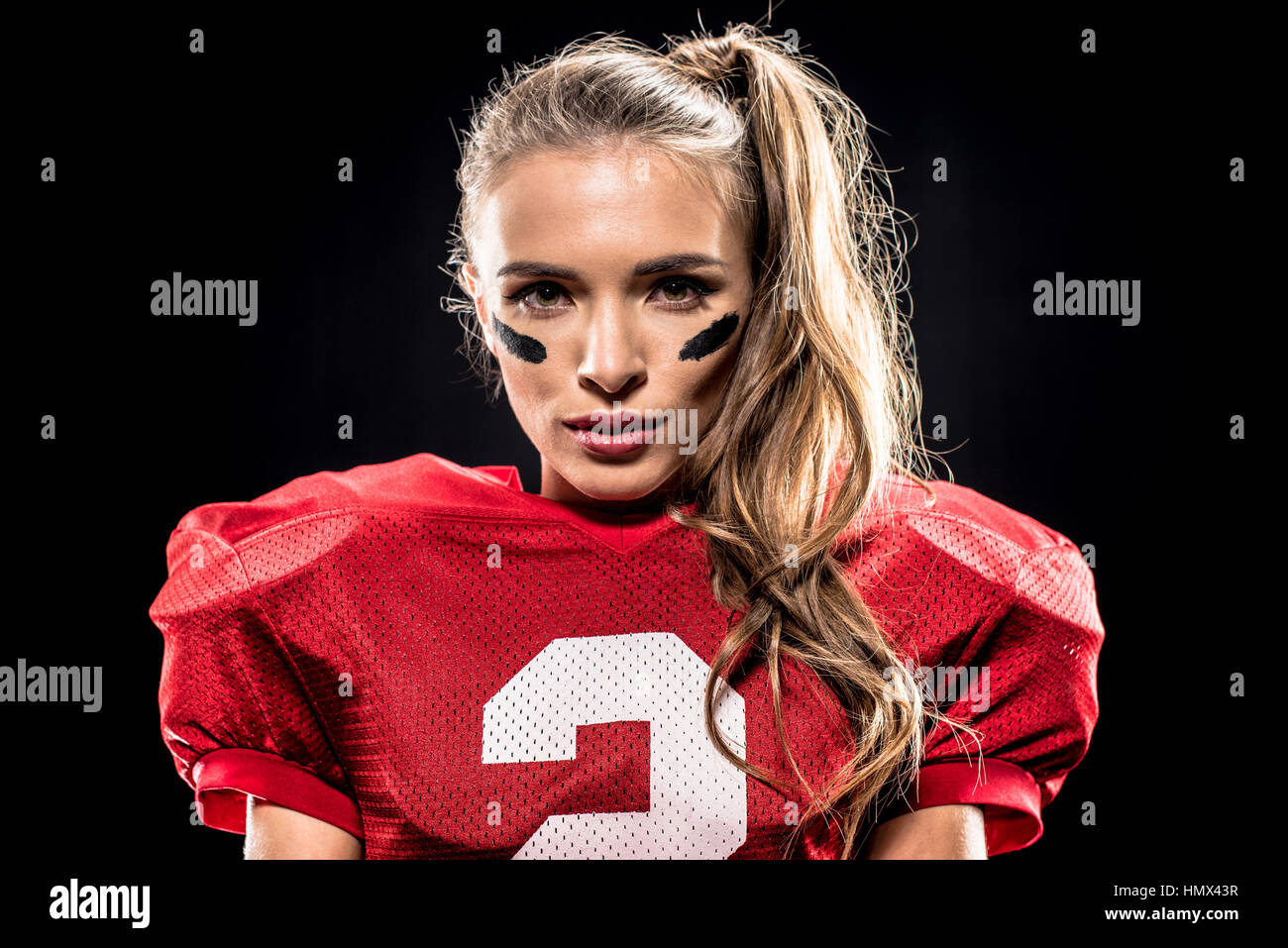 Femmina attraente giocatore di football americano Foto Stock