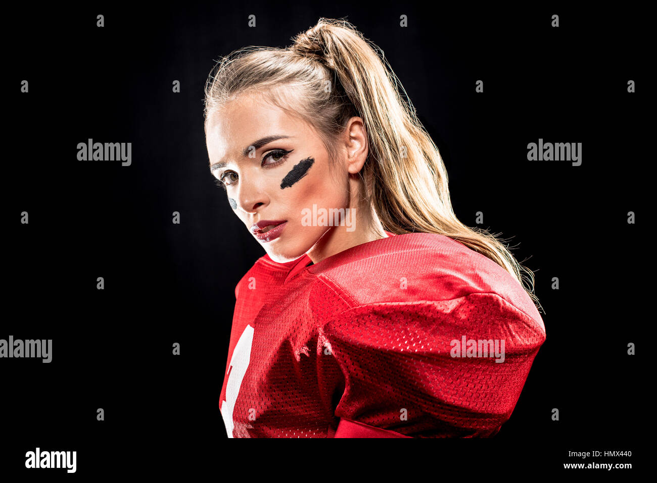 Femmina attraente giocatore di football americano Foto Stock