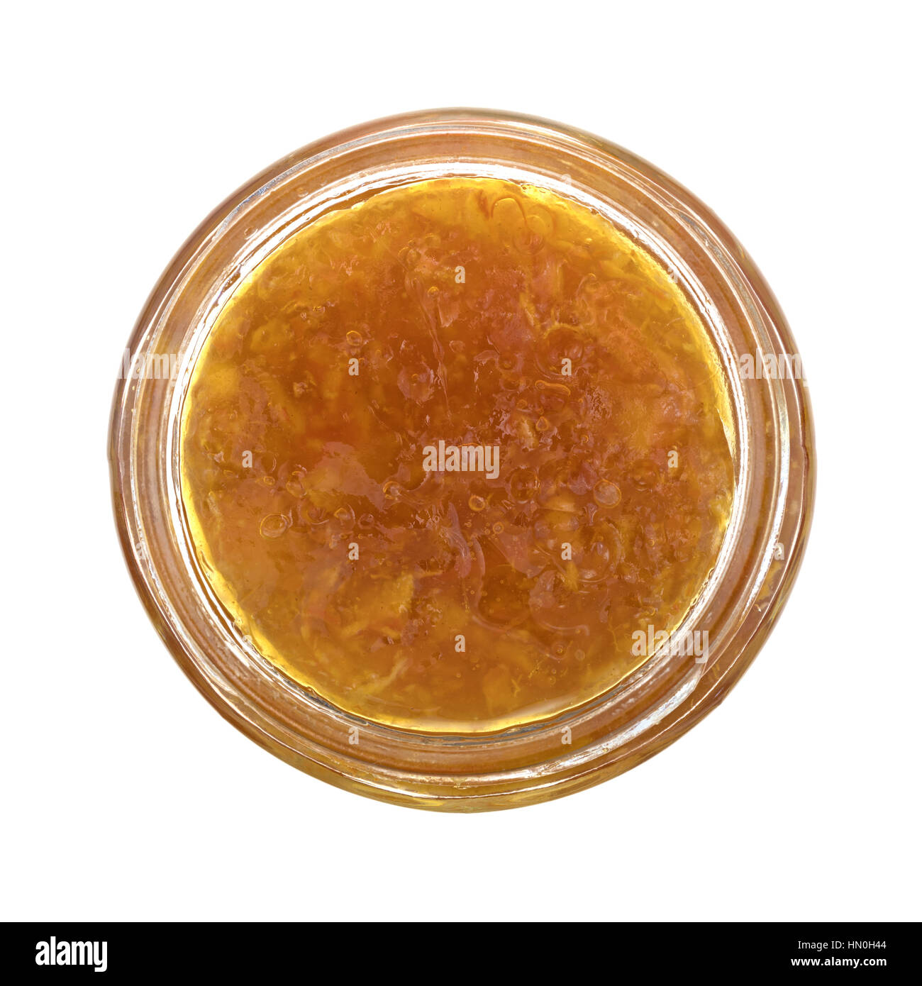 Vista dall'alto di zucchero libero marmellata di arance in un aperto il vasetto di vetro isolato su uno sfondo bianco. Foto Stock
