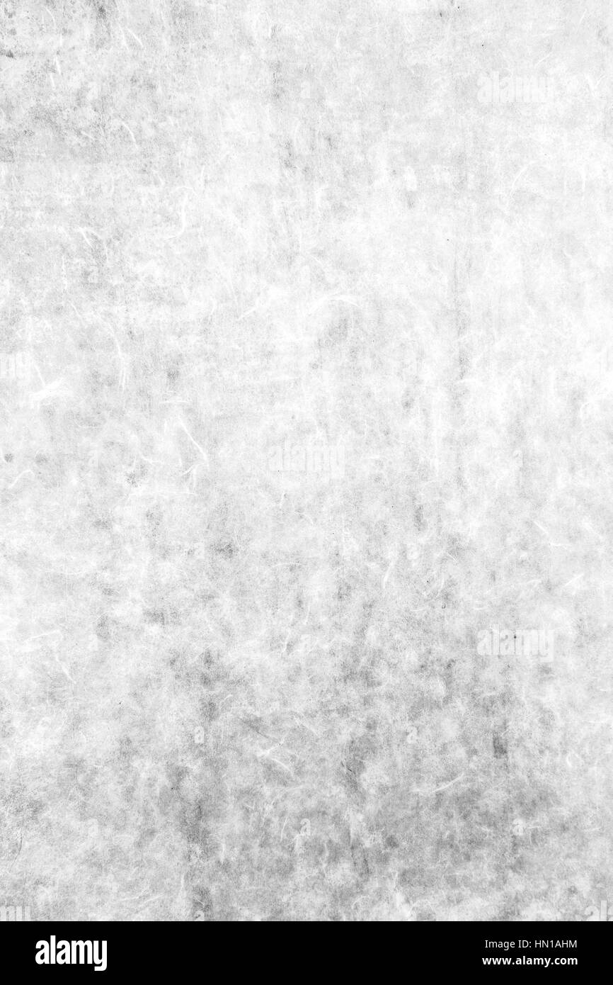 Close-up di un vecchio muro di carta sfondo texture in bianco e nero. Foto Stock