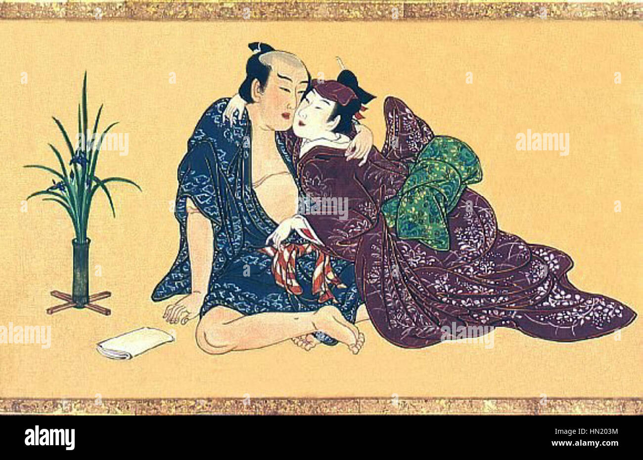 Il rotolo a mano di Miyagawa Issho è una forma d'arte tradizionale giapponese, spesso usata per scopi narrativi o devozionali. Questo rotolo specifico può rappresentare scene della letteratura, della religione o della cultura giapponese. Il lavoro di Issho esemplifica l'intricata arte e il significato culturale della pittura a pergamena del periodo Edo, riflettendo la bellezza e la precisione dell'artigianato giapponese. Foto Stock