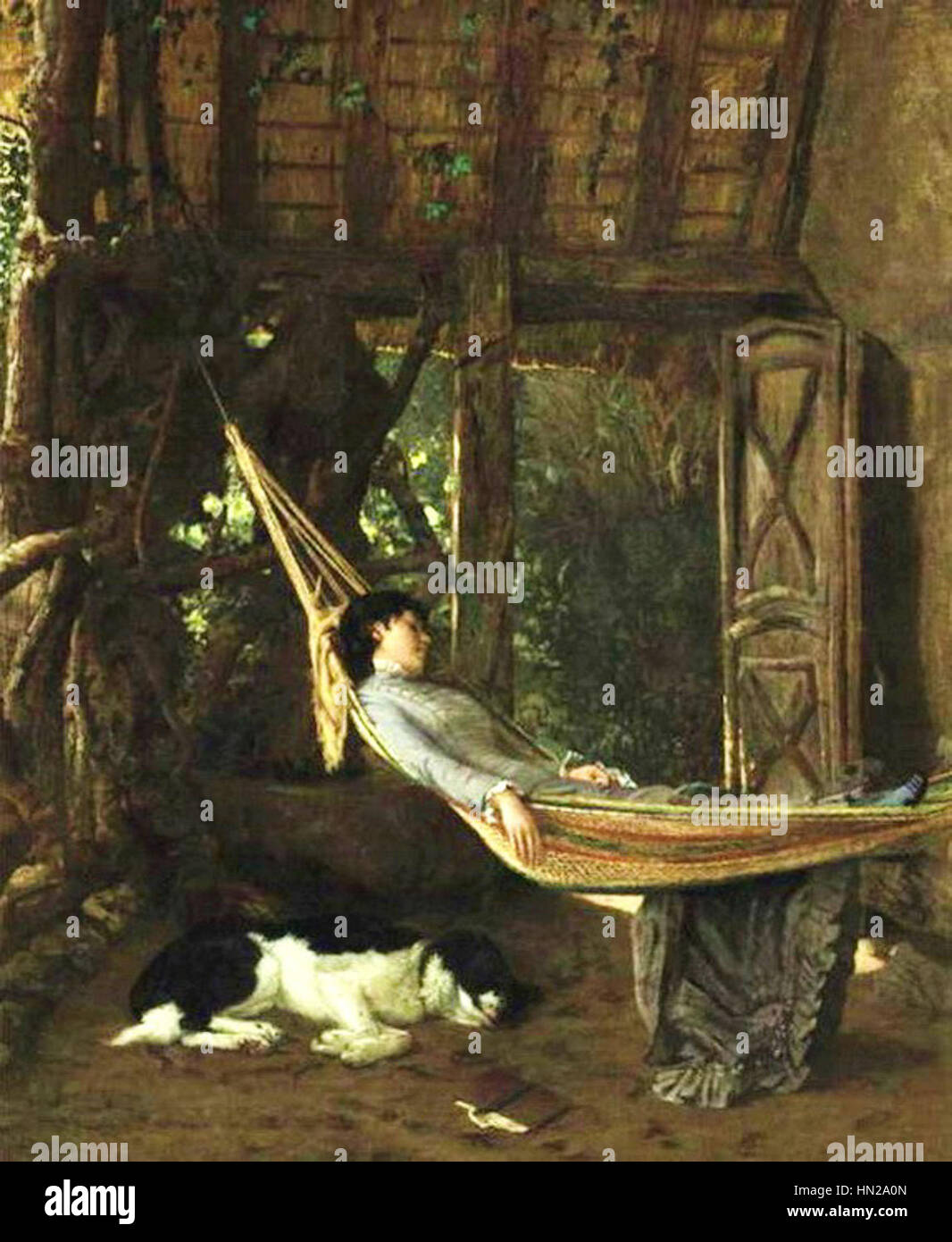 "Lilly Millet in a Hammock" di Francis Davis Millet è un ritratto sereno della moglie dell'artista, catturato in un momento di relax. Il dipinto riflette l'attenzione di Millet su scene intime e personali in uno stile naturalistico. Foto Stock
