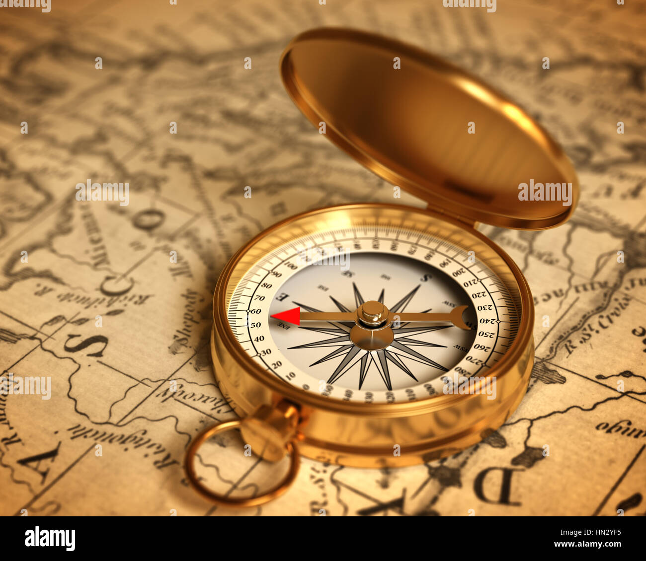 Bussola dorata sulla mappa Foto Stock