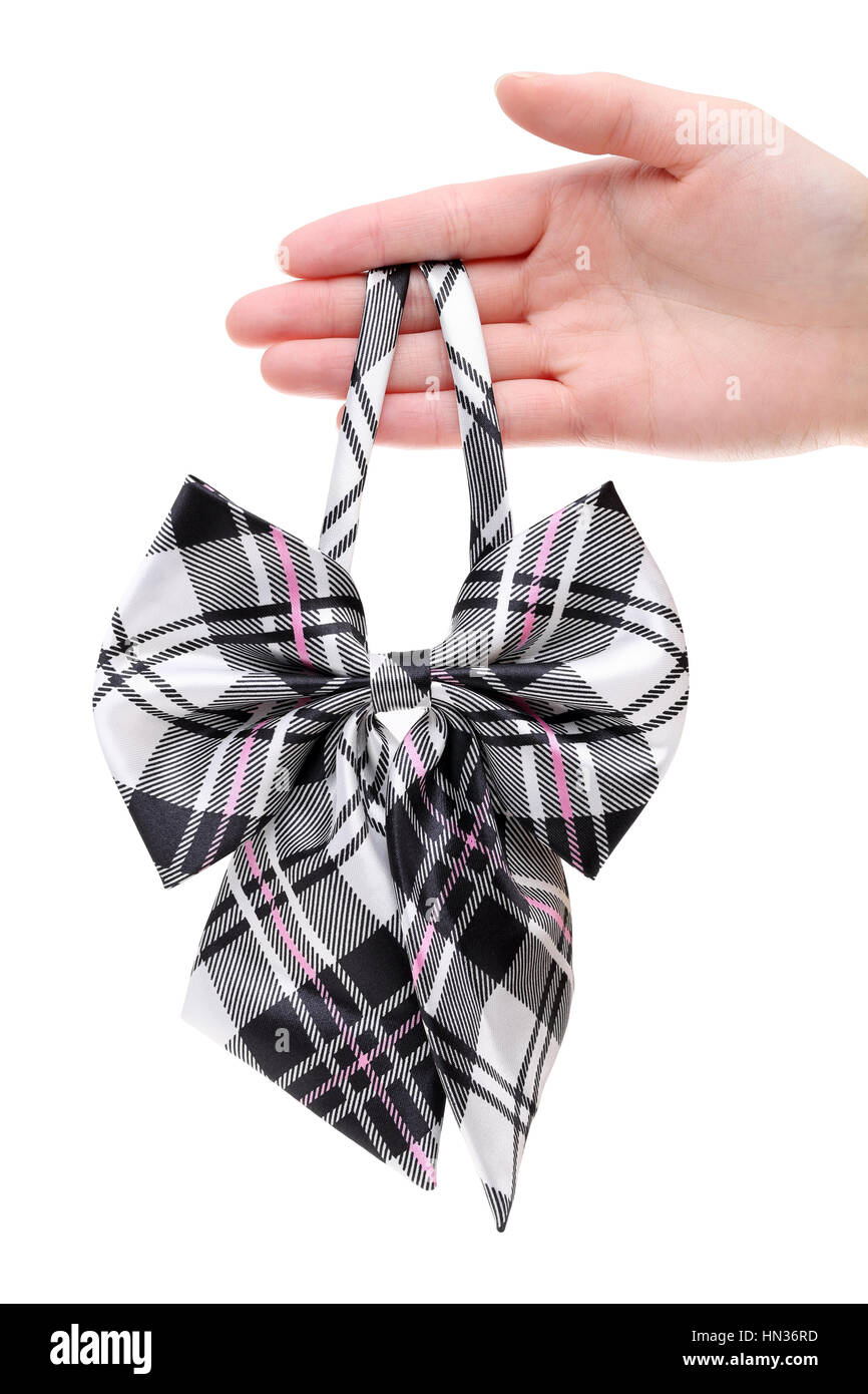 Mano che tiene il filtro bow tie per donna isolato su sfondo bianco Foto Stock