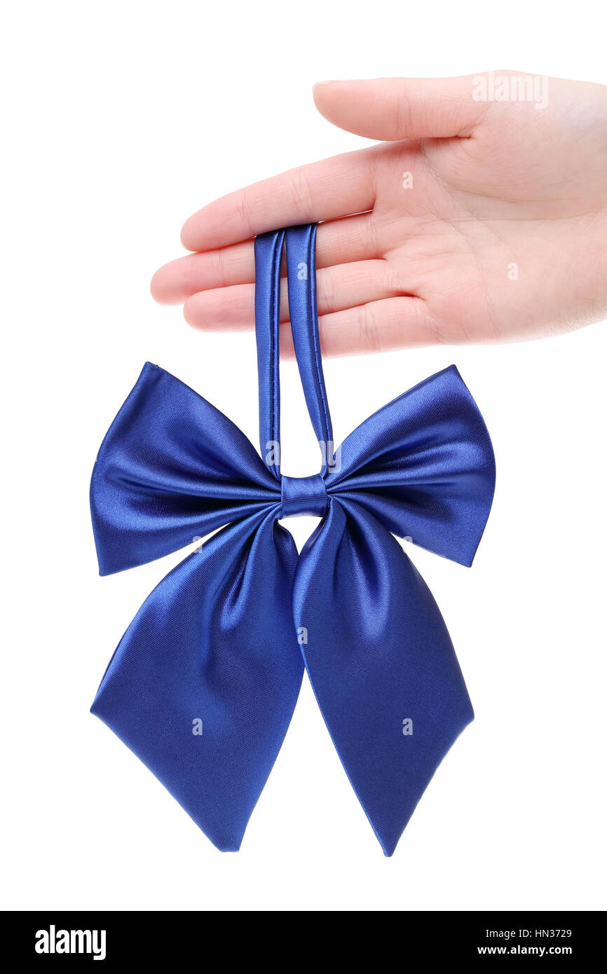 Mano che tiene il filtro bow tie per donna isolato su sfondo bianco Foto Stock