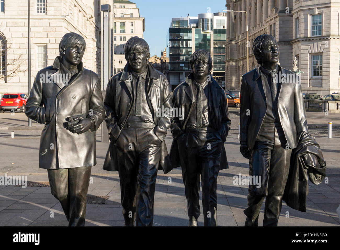 I Beatles scultura al Pier Head Liverpool per commemorare i 50 anni dalla loro ultima performance nella città Foto Stock