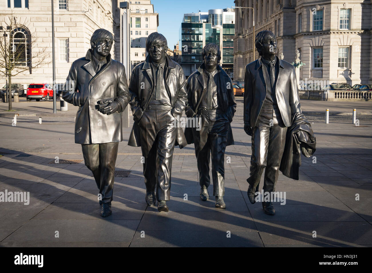 I Beatles scultura al Pier Head Liverpool per commemorare i 50 anni dalla loro ultima performance nella città Foto Stock