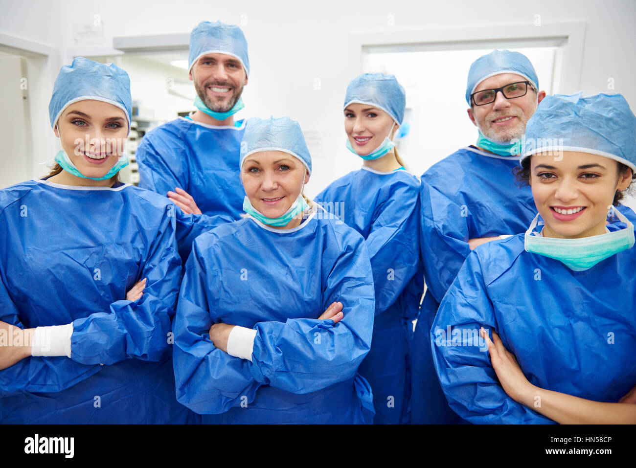 Team di allegro e professionisti medici Foto Stock