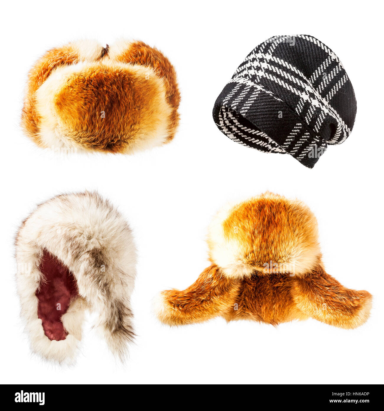 La pelliccia e cappelli di lana raccolta isolati su sfondo bianco, inverno caldi e morbidi cappucci alla moda Foto Stock