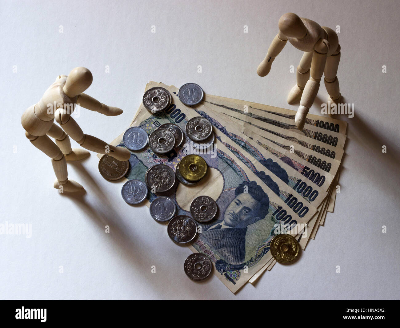 Manichino e valuta giapponese Foto Stock