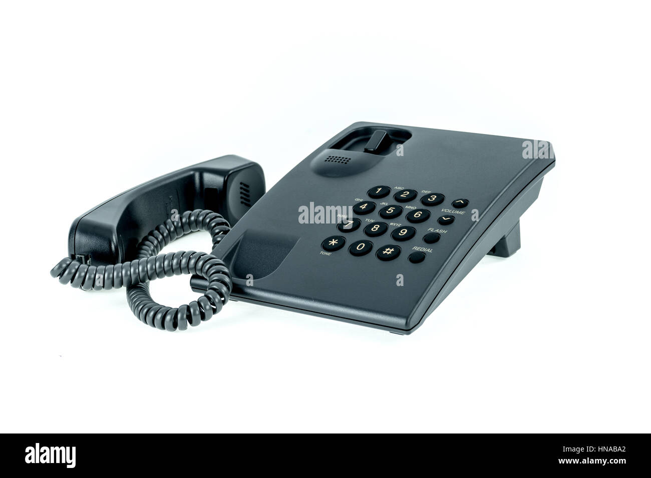 Ufficio nero telefono cellulare con ricevitore in prossimità di isolati su sfondo bianco Foto Stock