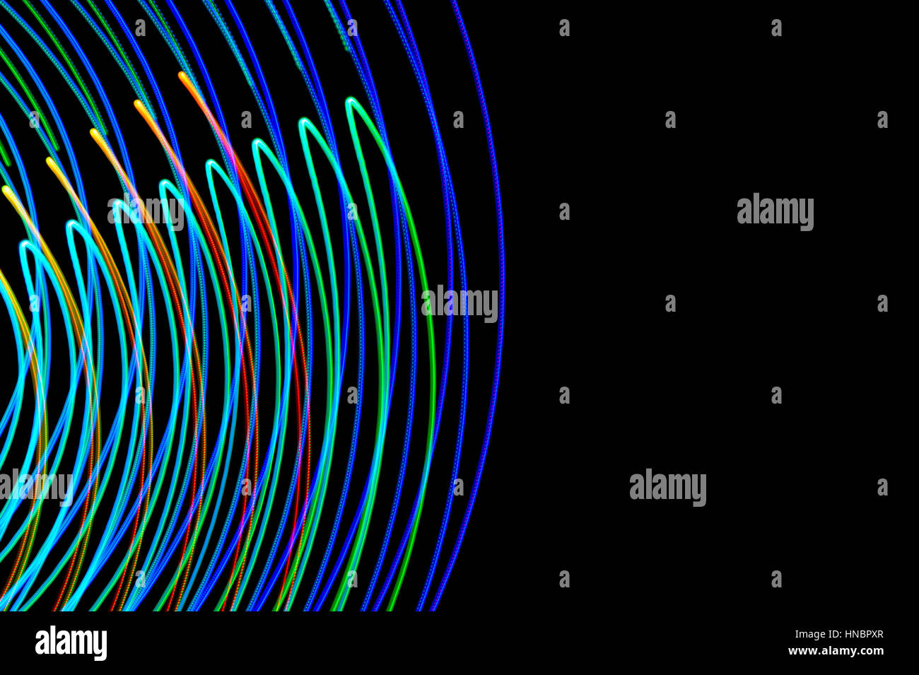 La pittura di luce. Abstract, futuristico, colorato con esposizione lunga, sfondo nero-11. Foto Stock