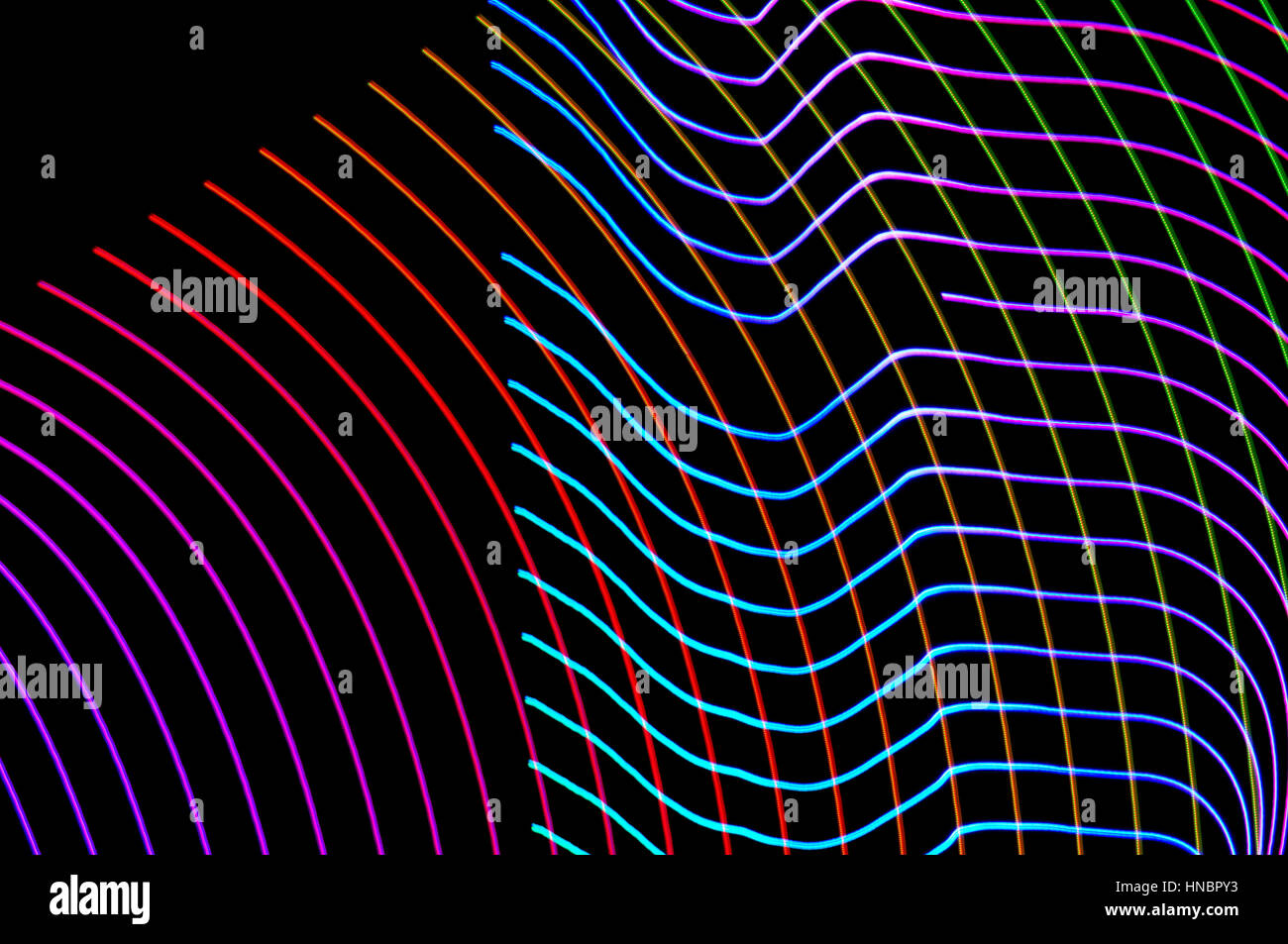 La pittura di luce. Abstract, futuristico, colorato con esposizione lunga, sfondo nero-14. Foto Stock