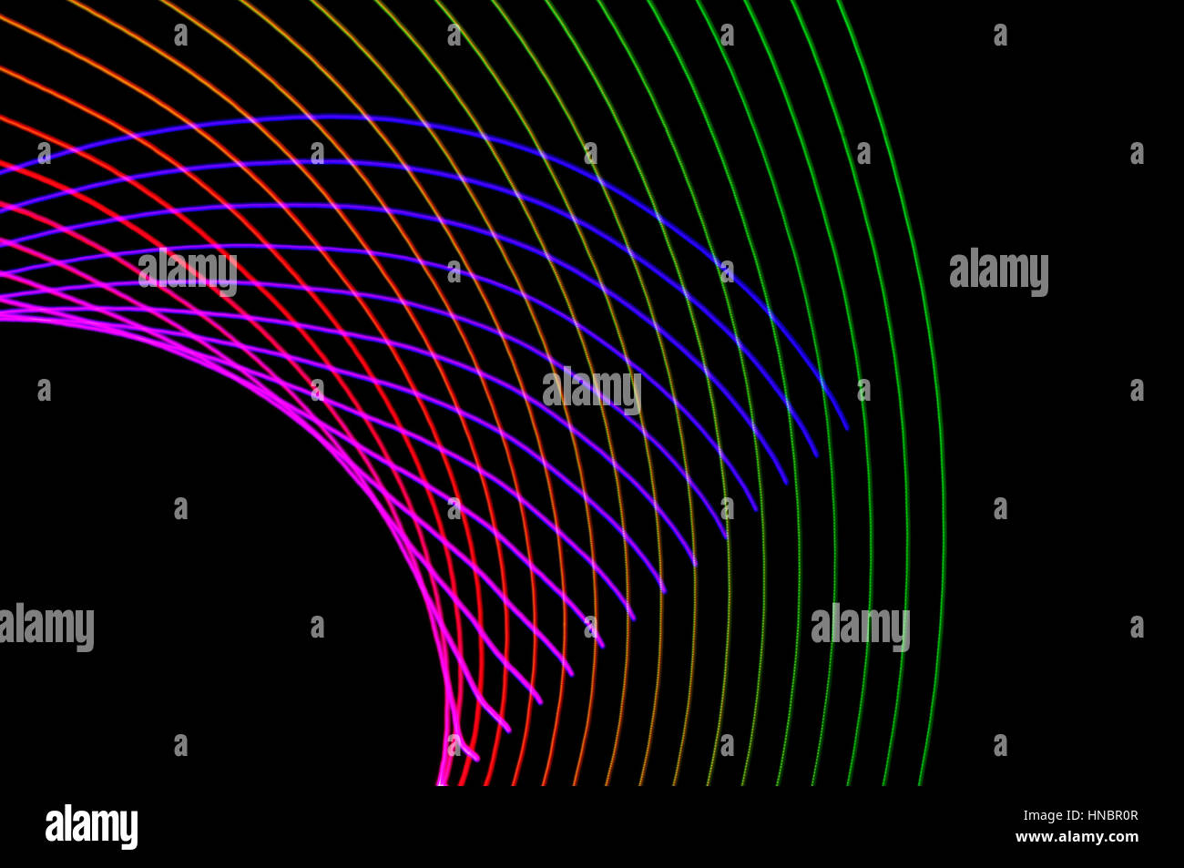 La pittura di luce. Abstract, futuristico, colorato con esposizione lunga, sfondo nero-24. Foto Stock
