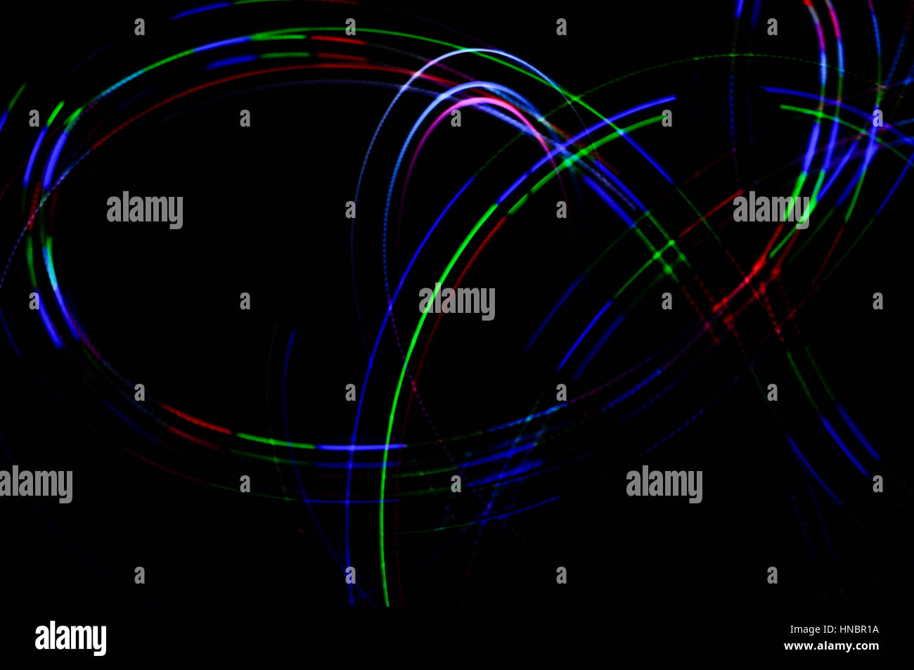 La pittura di luce. Abstract, futuristico, colorato con esposizione lunga, sfondo nero-31. Foto Stock