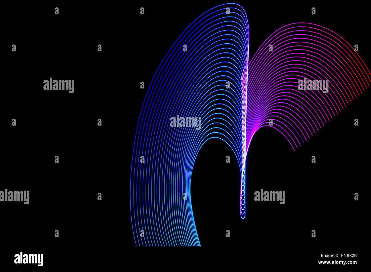 La pittura di luce. Abstract, futuristico, colorato con esposizione lunga, sfondo nero-43. Foto Stock