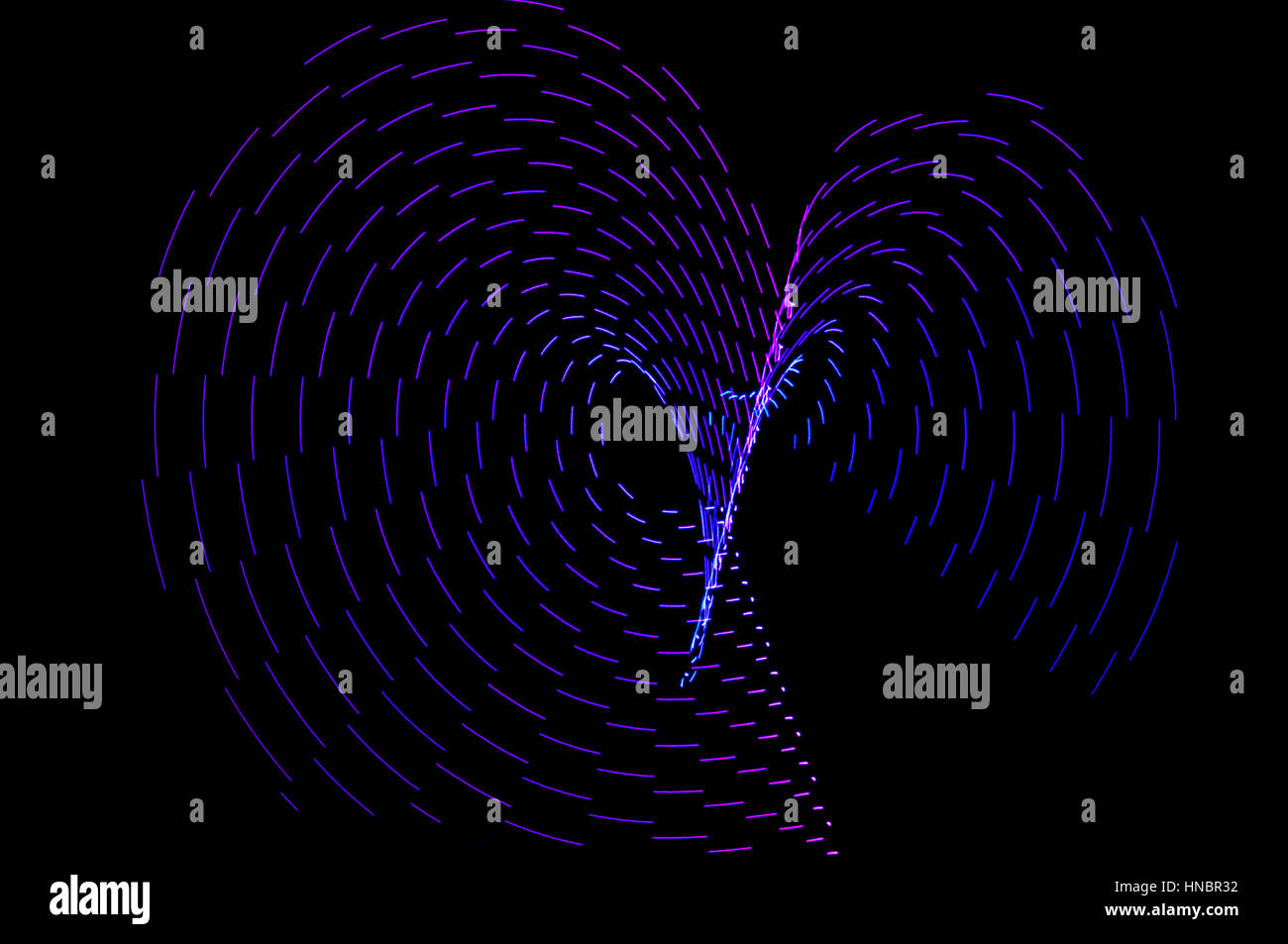 La pittura di luce. Abstract, futuristico, colorato con esposizione lunga, sfondo nero-52. Foto Stock