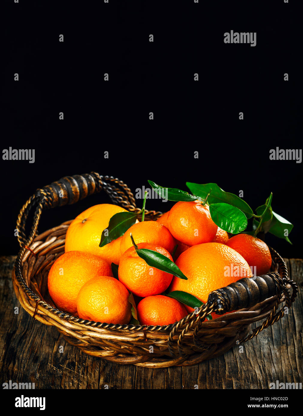 Arance fresche, i mandarini satsuma e clementine in un cestello Foto Stock