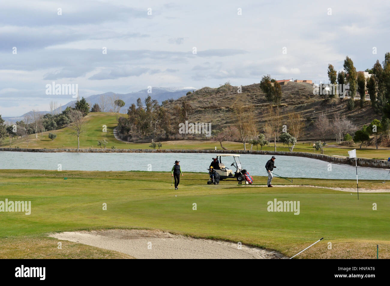 Campo da golf con i giocatori in inverno, 2017/02/12, Las Gabias-Granada, Spagna, 11:00. Foto Stock