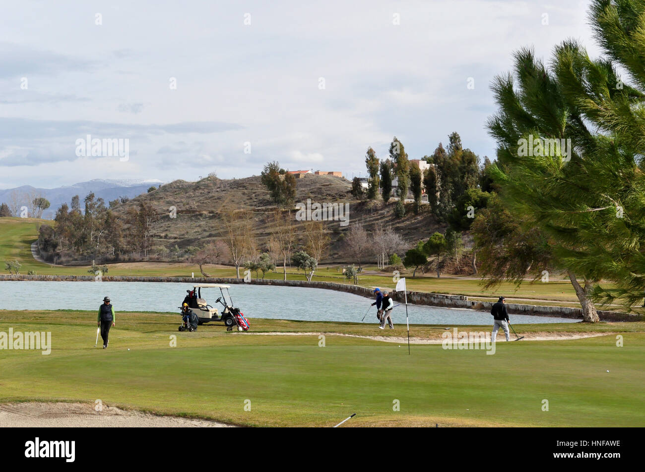 Campo da golf con i giocatori in inverno, 2017/02/12, Las Gabias-Granada, Spagna, 11:00. Foto Stock