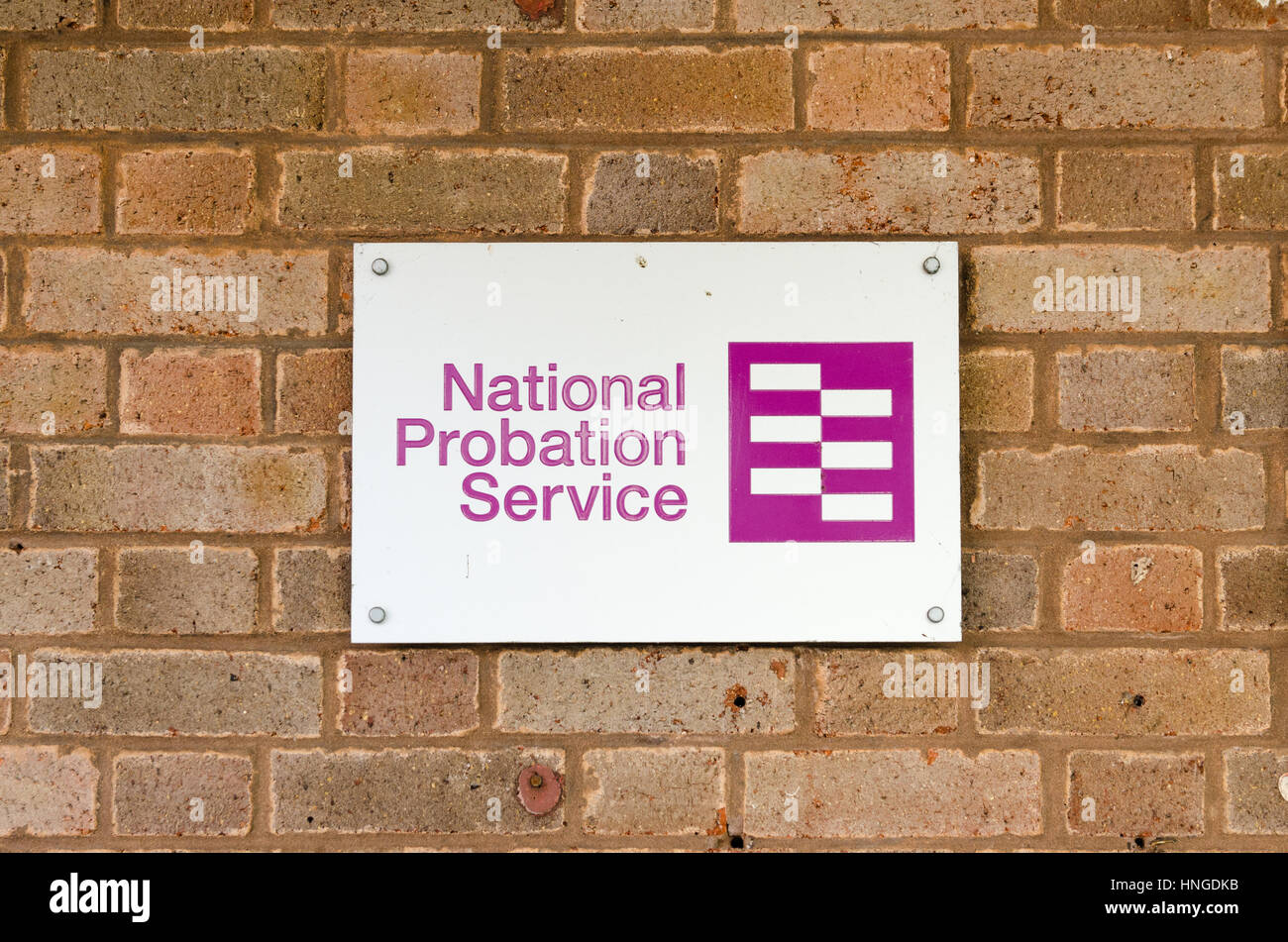 National Probation Service segno su un muro di mattoni Foto Stock