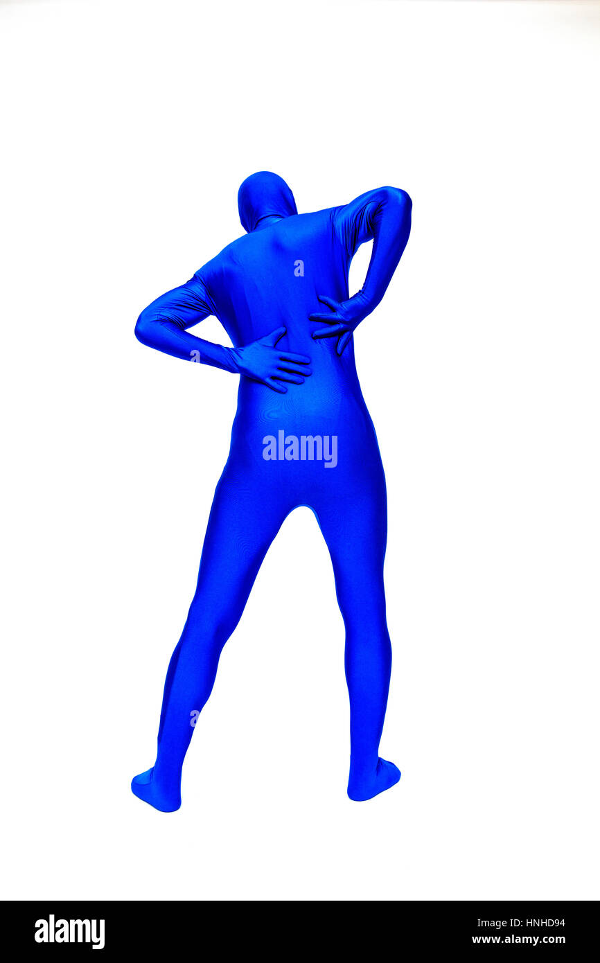 Misterioso uomo blu in morphsuit ha mal di schiena Foto Stock