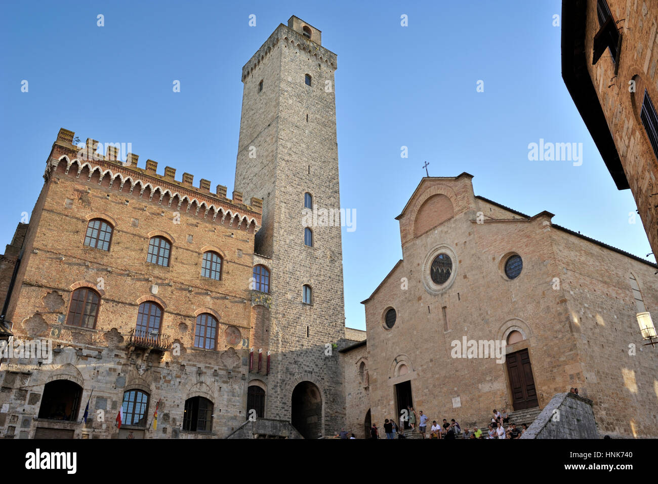 Palazzo del popolo e cattedrale, Piazza del Duomo, San Gimignano, Toscana, Italia Foto Stock