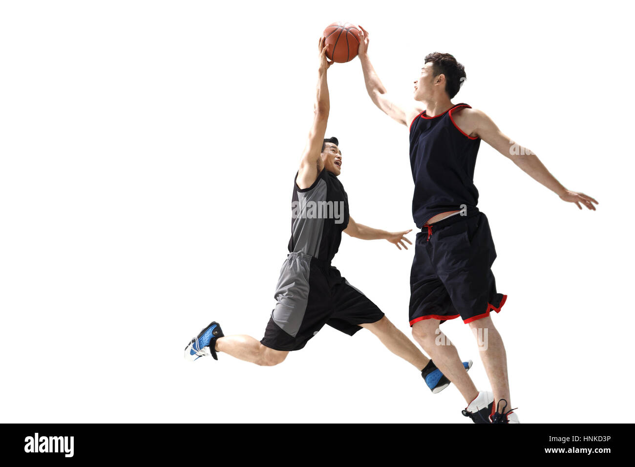 I giocatori di basket per giocare a pallacanestro Foto Stock