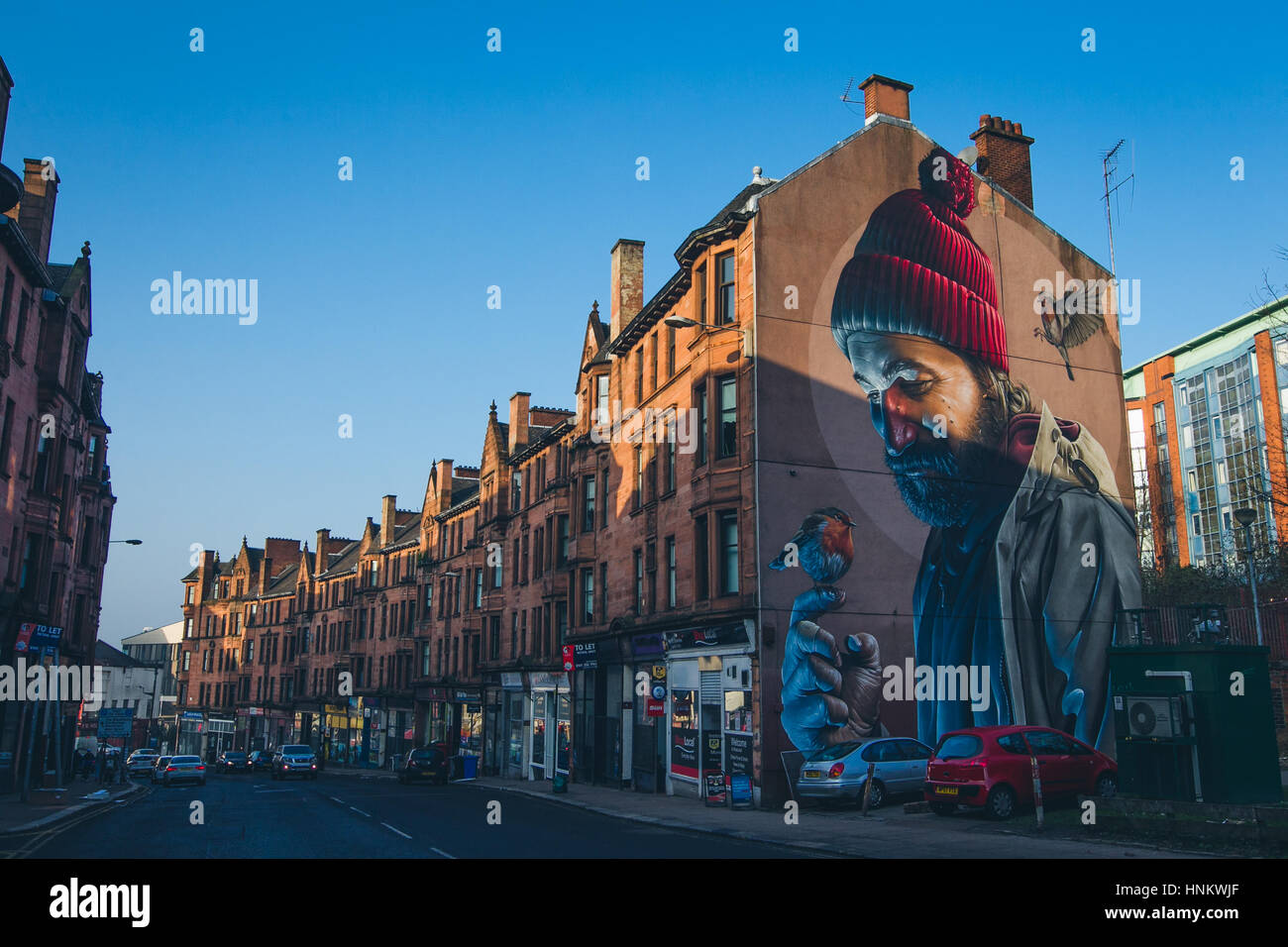 Il giorno moderno San Mungo graffiti, dal sorrisetto, David Airey, su High Street, Glasgow Scozia. Foto Stock