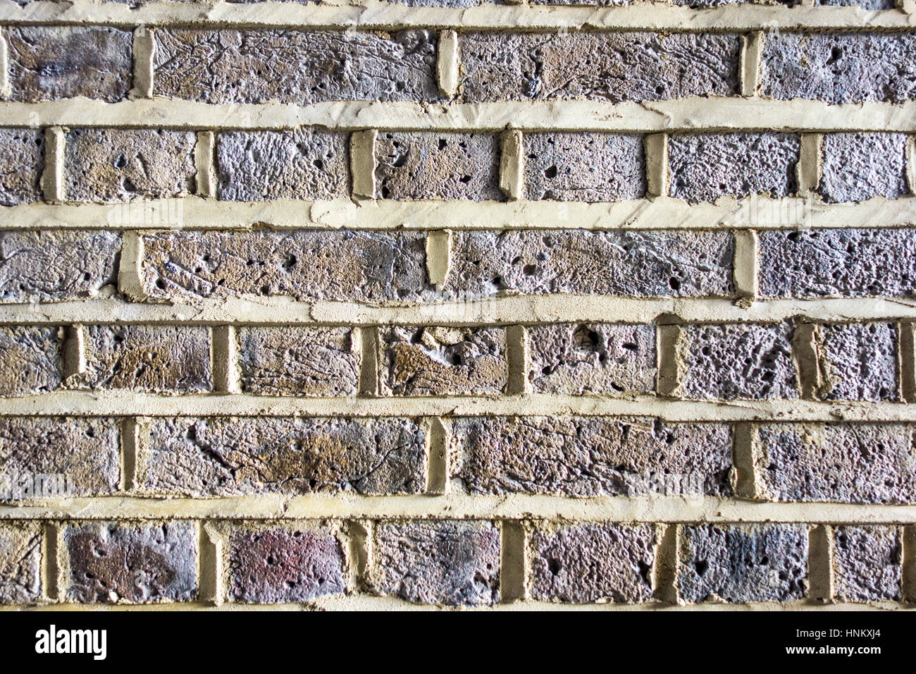 Muro di mattoni con nuovo orgogliosa rivolta verso l. Londra, Regno Unito Foto Stock
