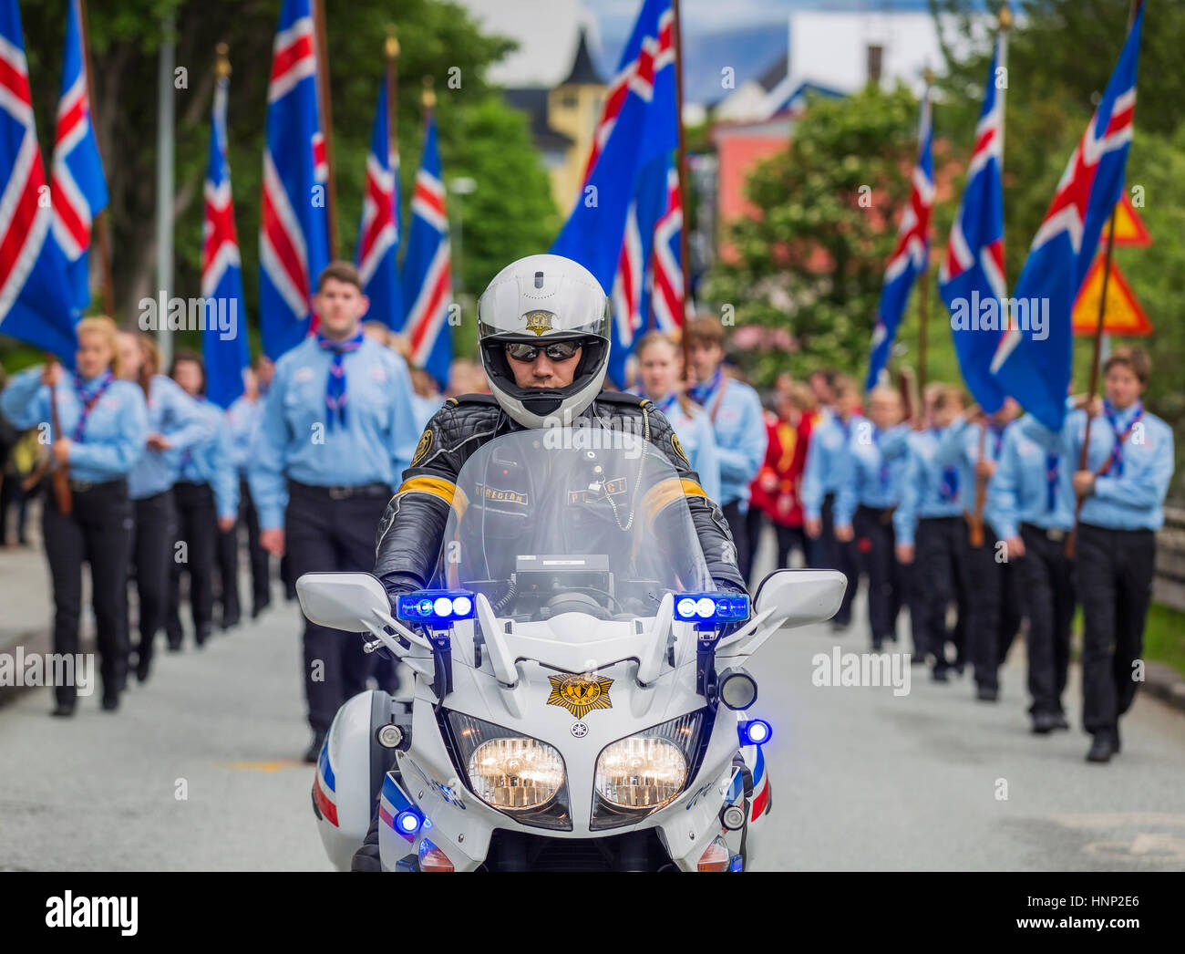 Leader in moto gli scout durante una parata, giorno di indipendenza, Reykjavik, Islanda Foto Stock