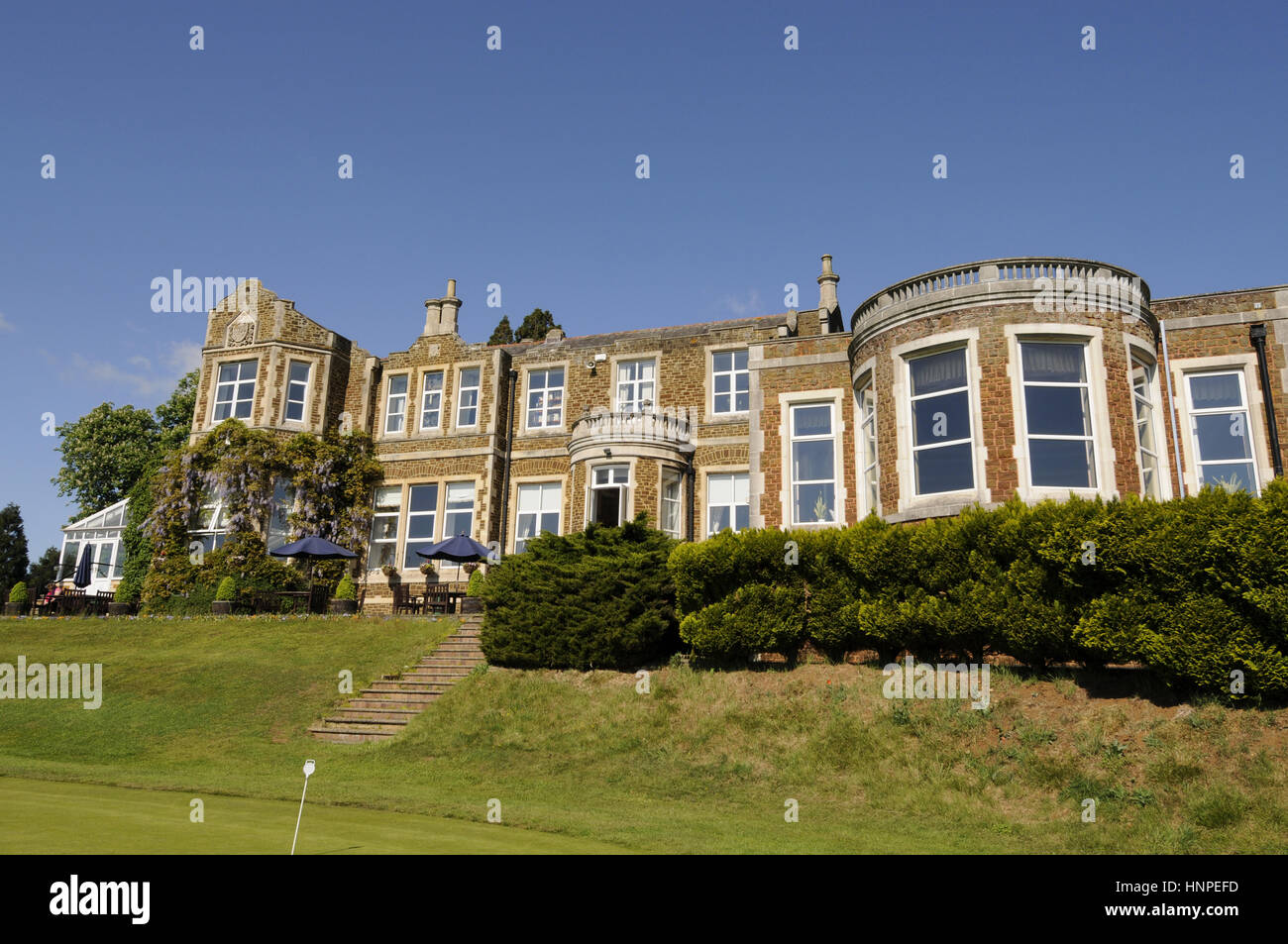 Vista la clubhouse da putting green, John O'Gaunt Golf Club Sandy Bedfordshire Inghilterra Foto Stock