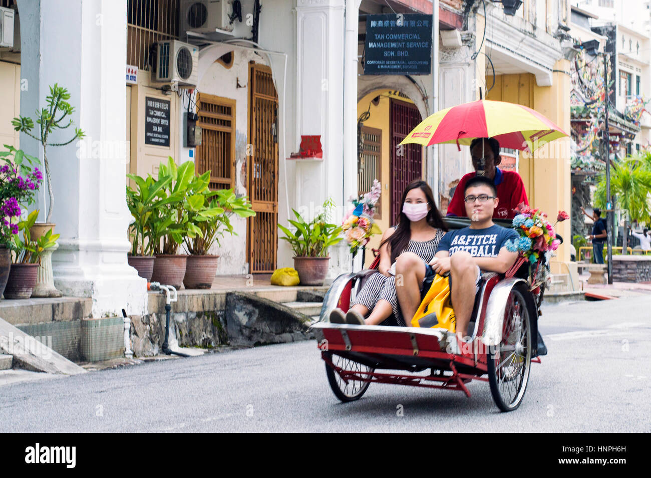 In trishaw turistica, Jalan Muntri, Georgetown, Penang, Malaysia Foto Stock
